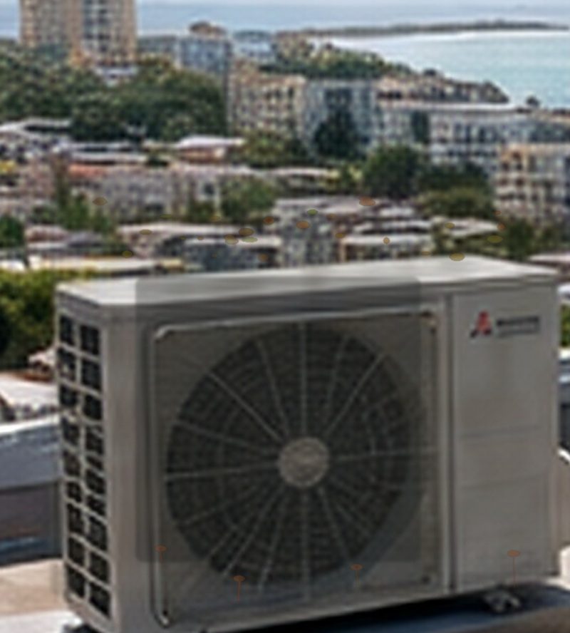 Before servicing: the outdoor condenser of a mini-split system, dirty and clogged (illustration).
