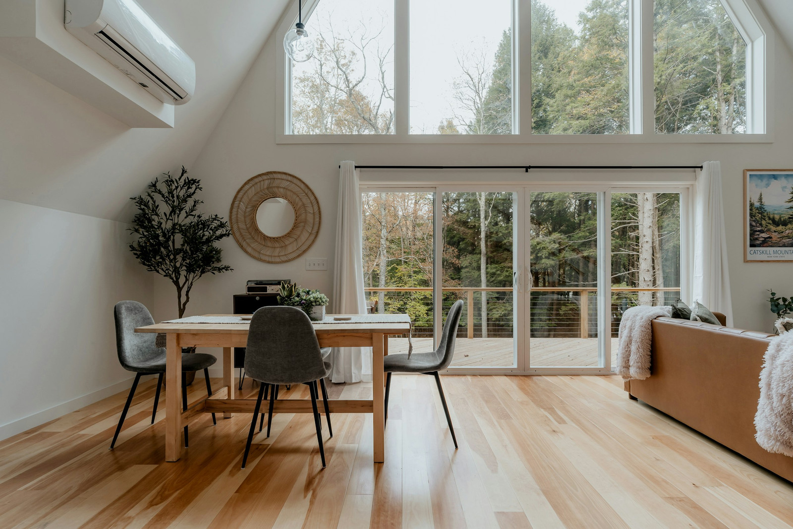 An open-plan living and dining space with a mini-split